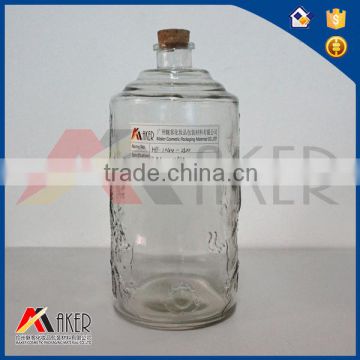2.5L round shape glass bottle with dragon picture