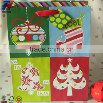 Custom popualr exquisite Christmas paper bag with glitter for sale