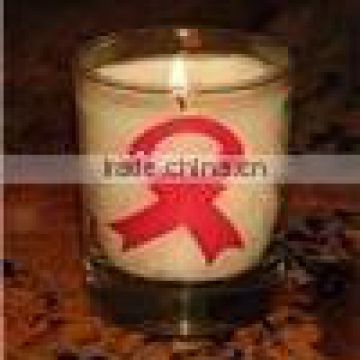 Aids Logo on a glass Candles