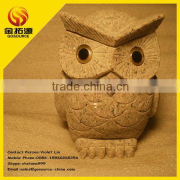 stone carving owl sculpture