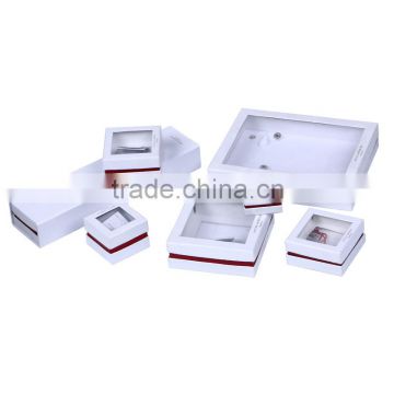 white and red paper jewelry small box with clear plastic window