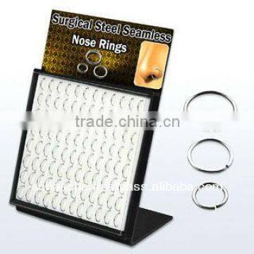 Display with 96 pcs. of surgical steel seamless nose rings, 20g (0.8mm) - length 5/16" to 3/8" (8mm - 10mm)