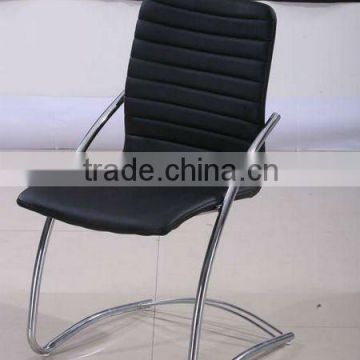 Dining chair with PU seat and back and chrome arms and legs