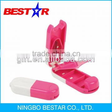 Plastic Pill Box with cutting blade