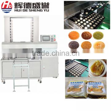 Automatic shortbread and pastry tray arranging machine