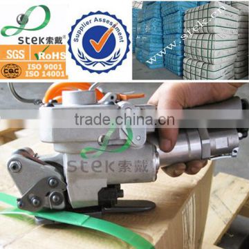 Pneumatic sealless plastic strapping tool