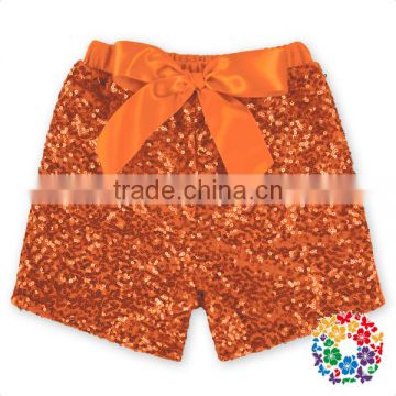 Wholesale boutique kids girl clothes orange sequin cotton ribbon bow sequin shorts baby summer shorts