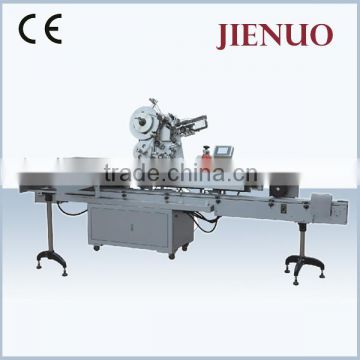 Capping and labeling machine