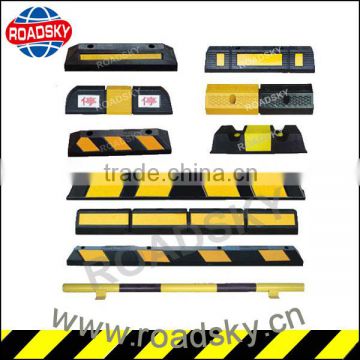 Black & Yellow Reflective Car Parking Stops On Road