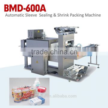AUTOMATIC SLEEVE SEALING AND SHRINK PACKING MACHINE