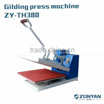 Gilding press machine