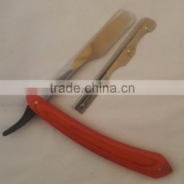 Metal shaving razor with wood handle