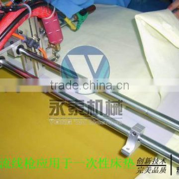 Disposable surgical mattress gluing machine