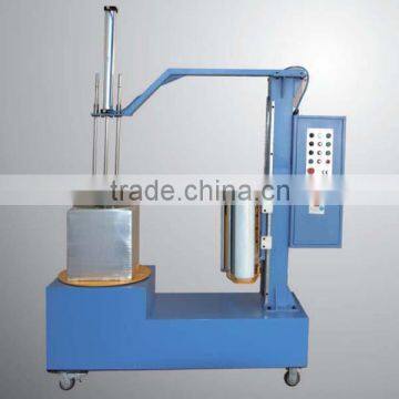 Mini type wrapping machine for packing small cartons