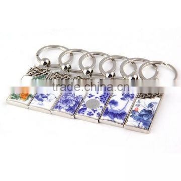 blue and white porcelain logo excellent qualtiy key chain with beautiful paper card