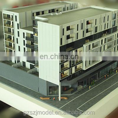 Scale 1:100 architecture models with miniature houses and trees for real estate