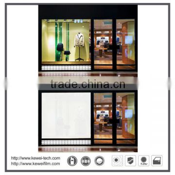 Kewei Switchable Smart Glass Utilizing rear projection, it shows motion picture on the store glass doo
