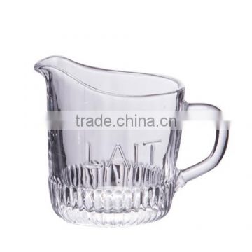 Clear glass milk jar with handle
