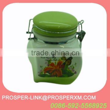 green ceramic storage canister