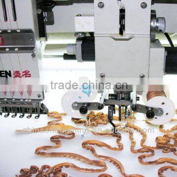 Taping embroidery machine