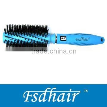 Round plastic hair brush with helix bristles
