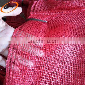 52*85 cm Light red onion cheap PE/PP raschel leno mesh bag for sale