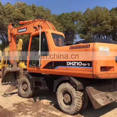 South korea made used Doosan DH210 wheel excavator 21ton wheel digger for sale in Shanghai China