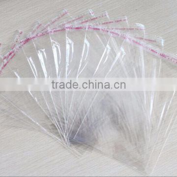 Clear OPP bag with adhesive strip/Opp cellophane bags with header