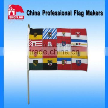 Promotional custom and national pe hand shaking waving flag with stick