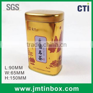 Golden oval-shaped metal tin box