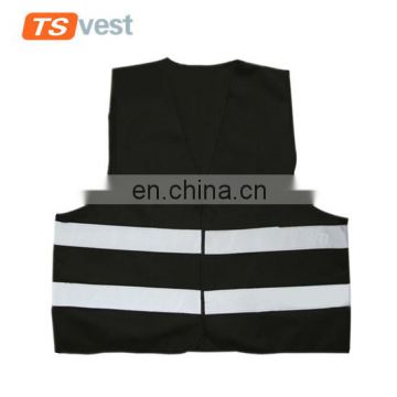Professional factory making black safety vest for warehouse worker