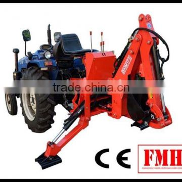 Small backhoe for farm tractor
