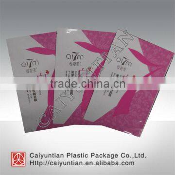 Printed foil laminated facial mask package bag with tear notch