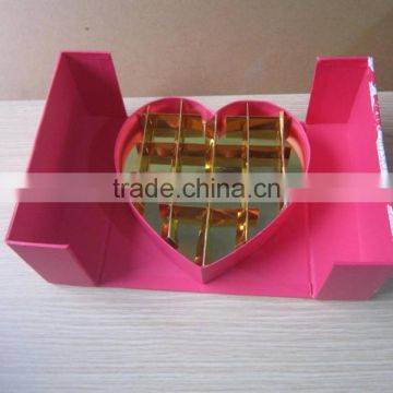 Elegant luxury cardboard chocolate box with heart shape inside