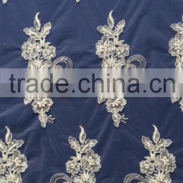 Guangzhou cheap embroidery lace fabric for wedding dress