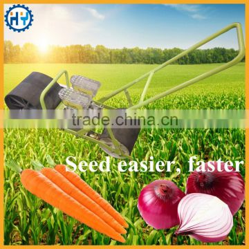 Low cost agricultural carrot seeder