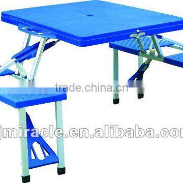 Blue plastic outdoor table and chairs