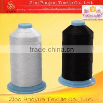 High tenacity bonded filament polyester thread