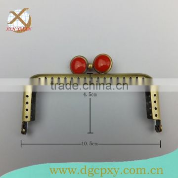 2015 Wholesale hand-sewing metal frame for purse with red coins gems