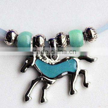Running Horses Painting with UV Active and Glow in the Dark Pendant Silicone Necklace