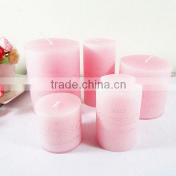 Supplying scented pink pillar candles