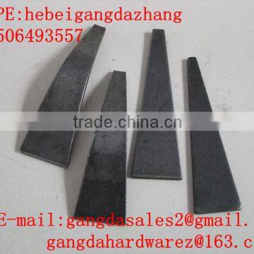 steel hardware wedge in concrete building