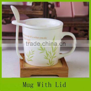 ceramic tea mug with lid and spoon for sale