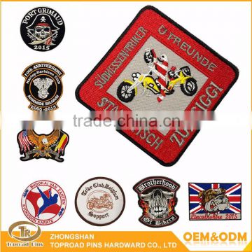 Zhongshan promotional custom embroidery sew on clothing woven patches no minimum custom lady rider patch for women