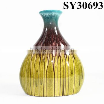 Small glazed ceramic yellow indoor vase