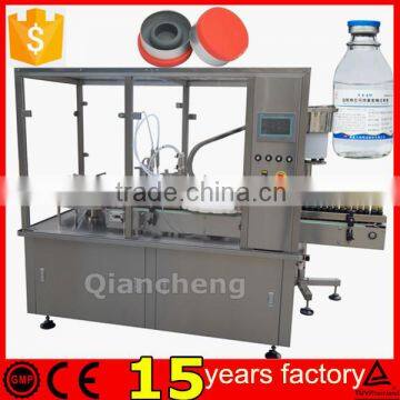 Qiancheng PLC controlled glass bottle filling machine,liquid filling and capping machine