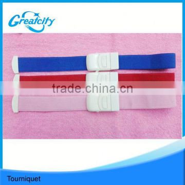 Disposable medical tourniquet with ABS buckle