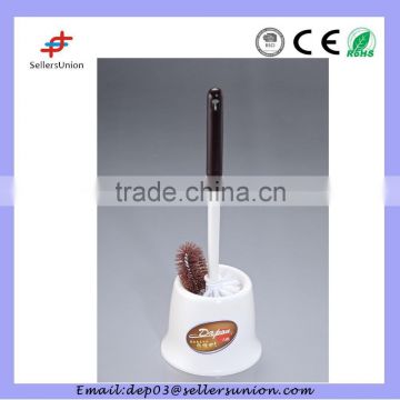 Brown plastic curved toilet brush with holders