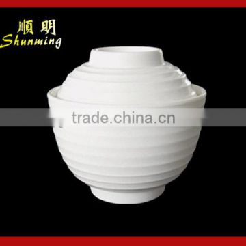 White plastic cup with lid