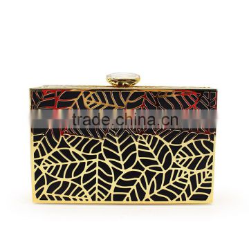 2016 Hollow leaves pattern design metal clutch for ladies